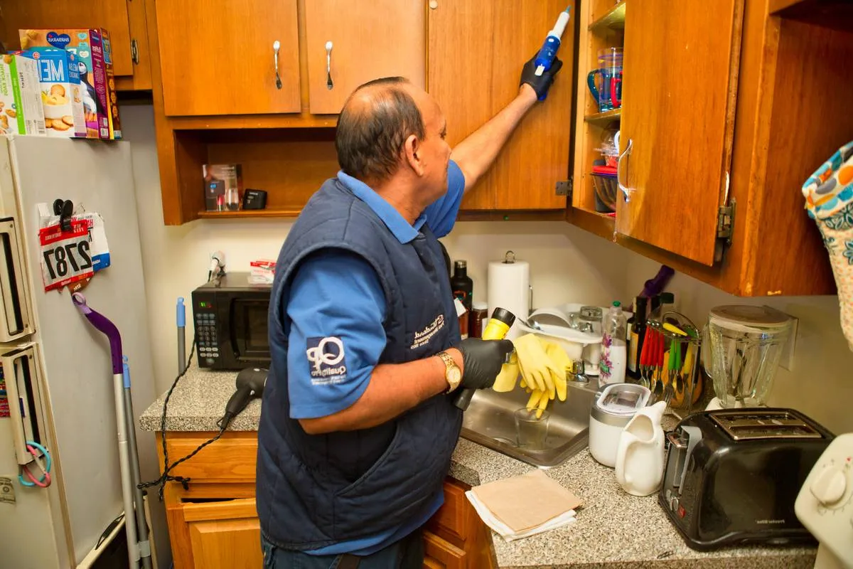 IPM technician working in university research facility