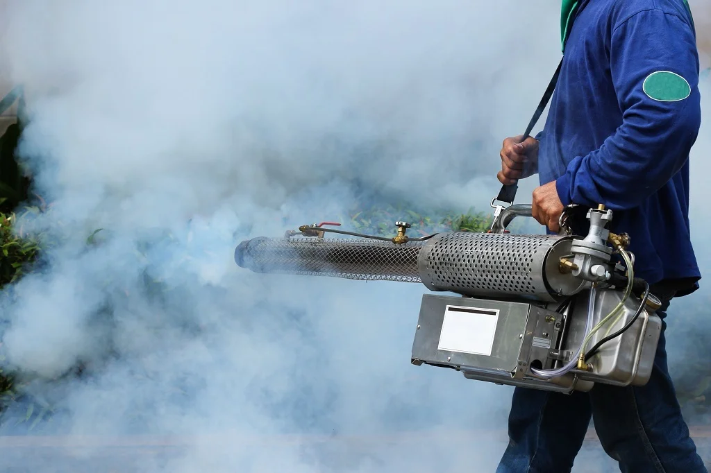 Mosquito control treatment in Iowa backyard